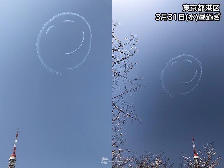 東京の空にニコちゃんマーク出現 曲技飛行パイロット室屋さんが描く - ウェザーニュース